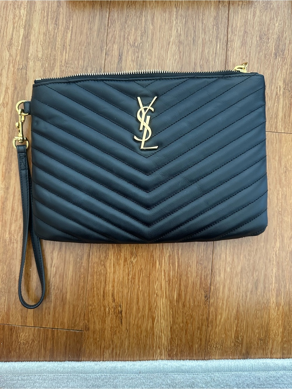 Saint Laurent Black Quilted Leather Wristlet with Gold YSL Emblem